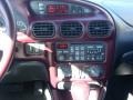 2002 Pontiac Grand Prix Ruby Red Interior Controls Photo