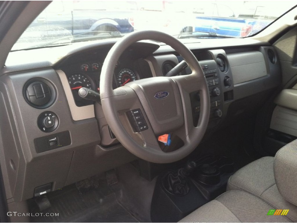 2010 F150 STX SuperCab 4x4 - Tuxedo Black / Medium Stone photo #11