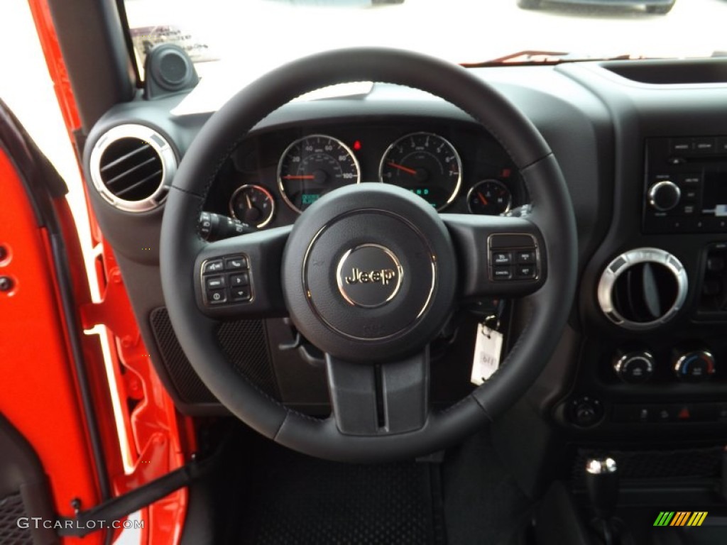 2013 Jeep Wrangler Unlimited Sahara 4x4 Black Steering Wheel Photo #76273922