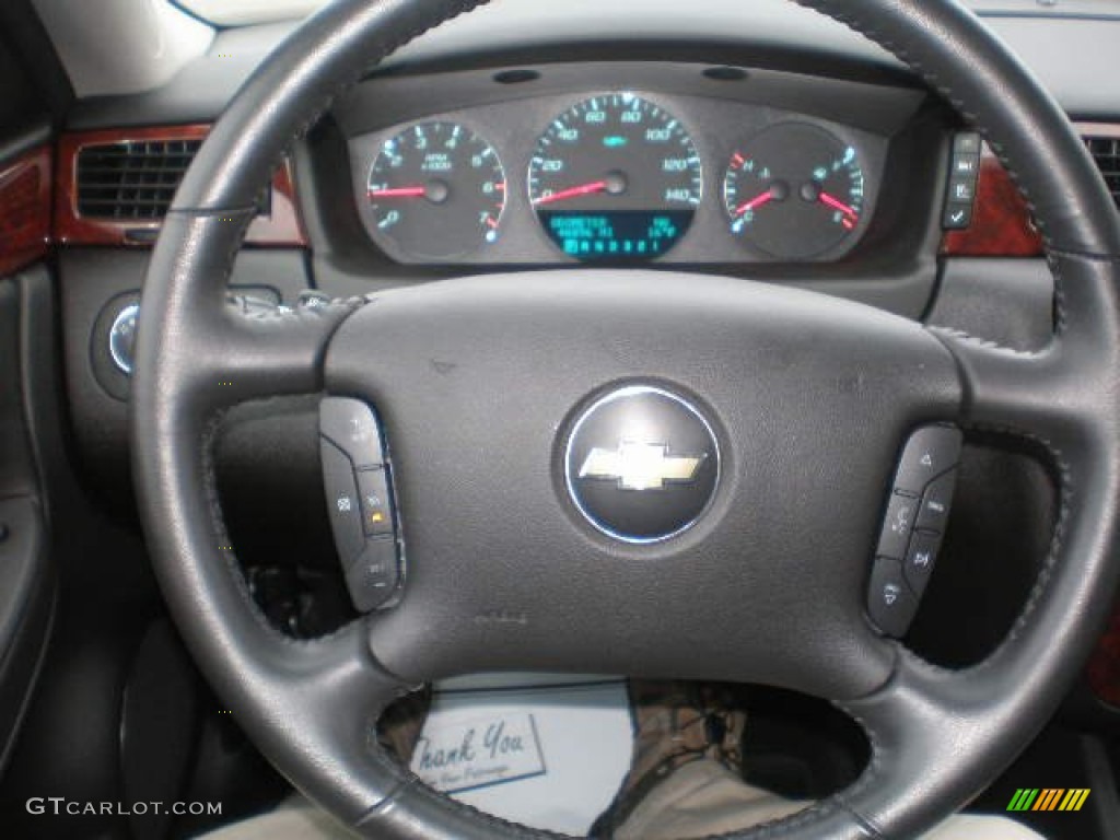 2010 Chevrolet Impala LT Ebony Steering Wheel Photo #76285869