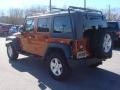 2011 Mango Tango Pearl Jeep Wrangler Unlimited Rubicon 4x4  photo #4