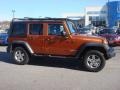 2011 Mango Tango Pearl Jeep Wrangler Unlimited Rubicon 4x4  photo #6