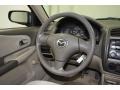 2003 Mazda Protege Beige Interior Steering Wheel Photo