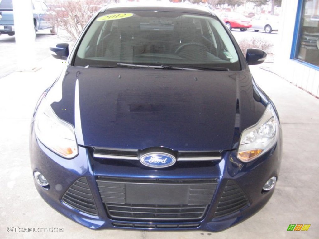 2012 Focus SE SFE Sedan - Kona Blue Metallic / Charcoal Black photo #7