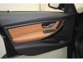 2013 BMW 3 Series Saddle Brown Interior Door Panel Photo