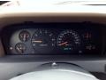 2003 Jeep Grand Cherokee Sandstone Interior Gauges Photo