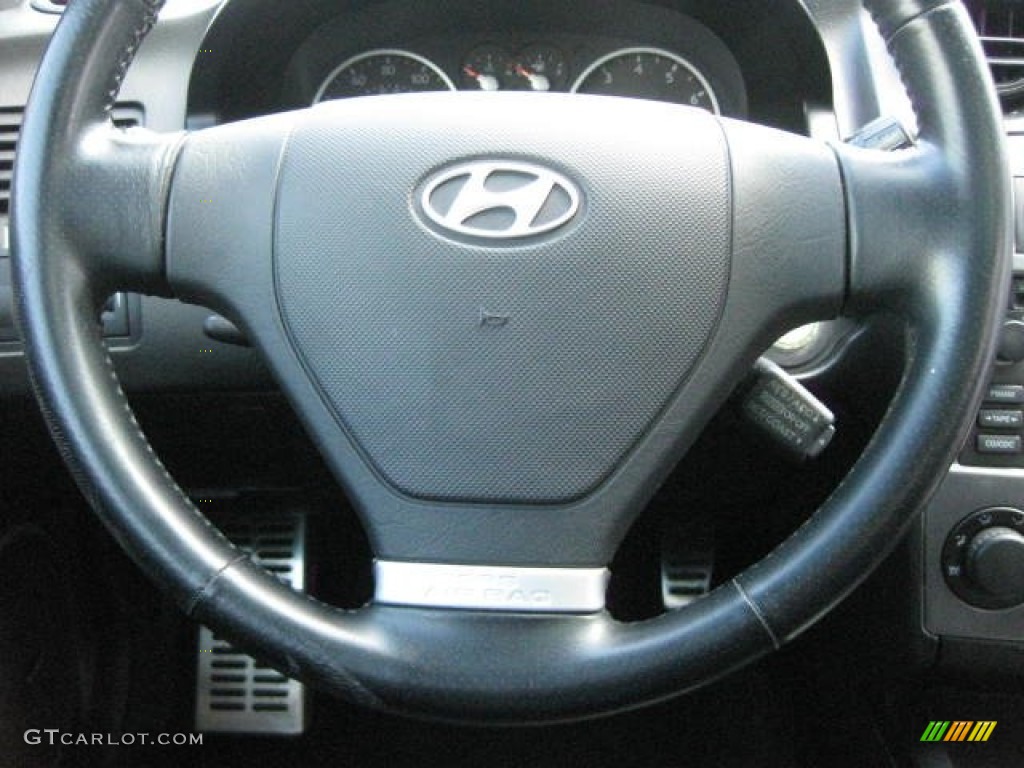 2004 Hyundai Tiburon GT Special Edition Black Steering Wheel Photo #76484207