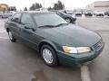 1999 Woodland Pearl Toyota Camry LE  photo #1