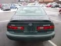 1999 Woodland Pearl Toyota Camry LE  photo #6
