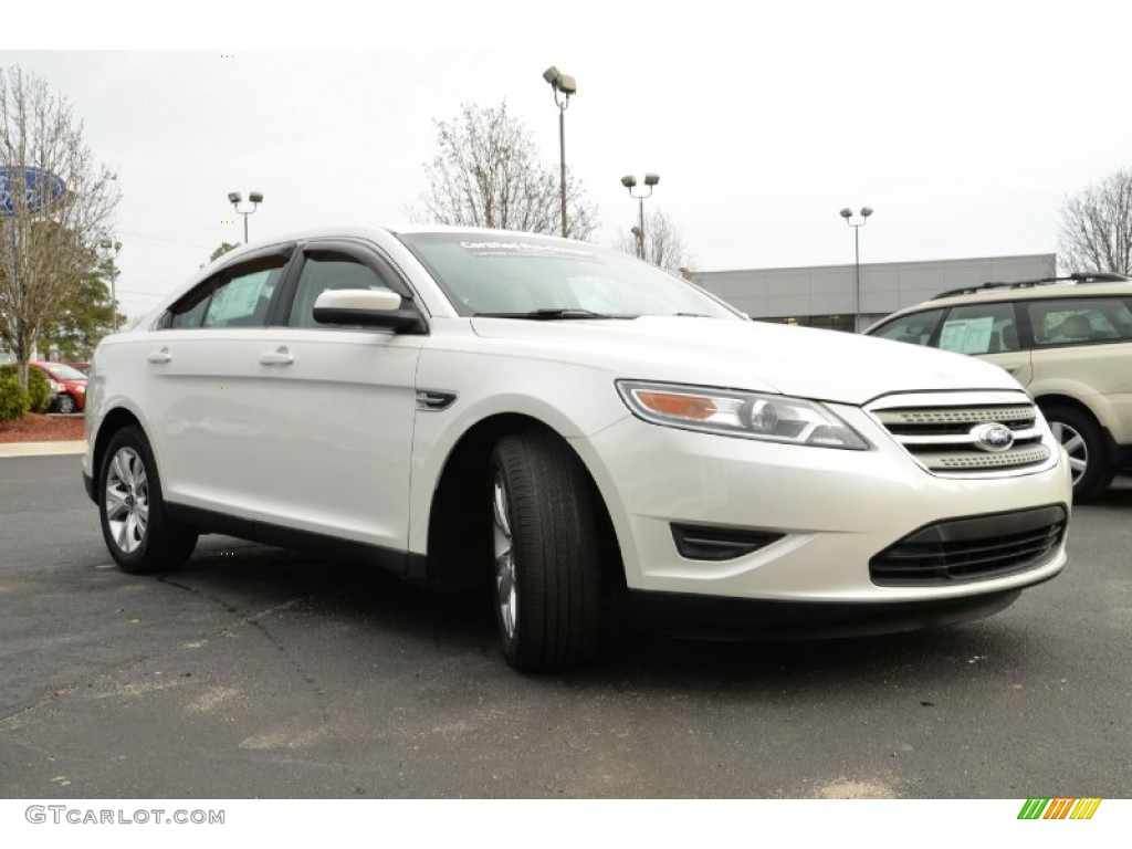 White Suede Metallic 2010 Ford Taurus SEL Exterior Photo #76537989