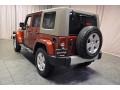 2010 Red Rock Crystal Pearl Jeep Wrangler Unlimited Sahara 4x4  photo #19
