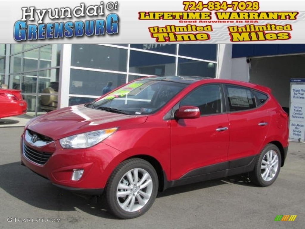 2013 Tucson Limited AWD - Garnet Red / Taupe photo #1