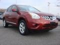 2011 Cayenne Red Nissan Rogue SV  photo #1