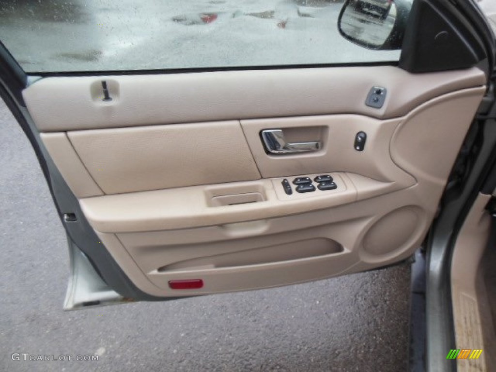 2003 Ford Taurus SES Medium Parchment Door Panel Photo #76596142