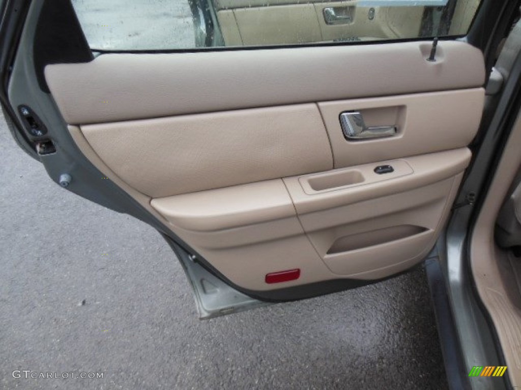 2003 Ford Taurus SES Medium Parchment Door Panel Photo #76596154