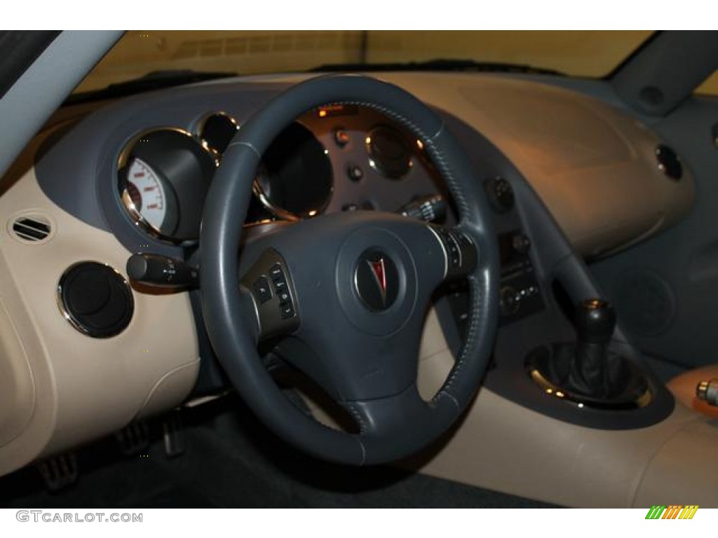 2007 Pontiac Solstice Roadster Steel/Sand Steering Wheel Photo #76608598