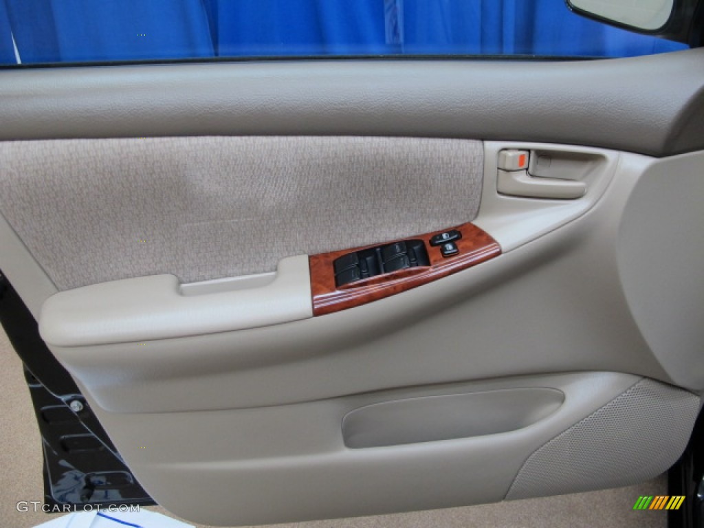 2004 Corolla LE - Black / Pebble Beige photo #31