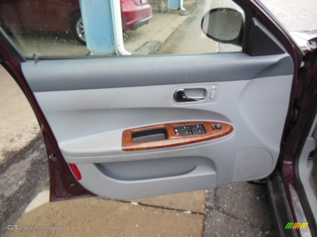 2006 Buick LaCrosse CX Gray Door Panel Photo #76654098