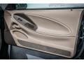 Medium Parchment Door Panel Photo for 2004 Ford Mustang #76657983