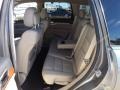 2012 Jeep Grand Cherokee Black/Light Frost Beige Interior Rear Seat Photo