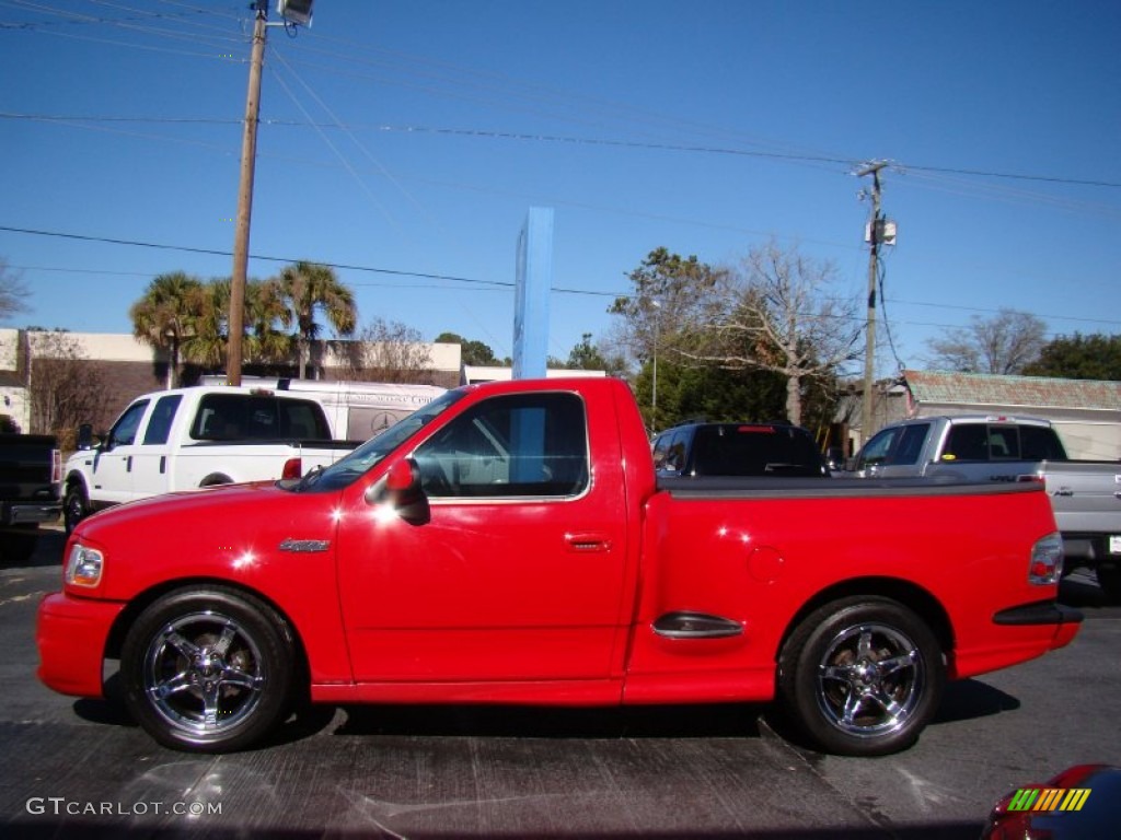 Bright Red 2003 Ford F150 SVT Lightning Exterior Photo #76680792