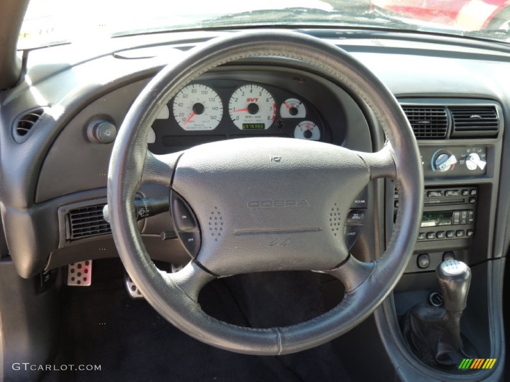 2003 Ford Mustang Cobra Coupe Dark Charcoal/Medium Graphite Steering Wheel Photo #76686672