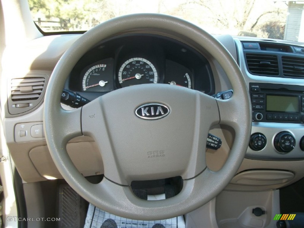 2009 Kia Sportage LX V6 4x4 Beige Steering Wheel Photo #76696153