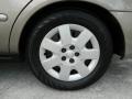 2002 Ford Taurus LX Wheel and Tire Photo