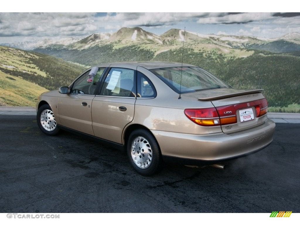 2002 L Series L100 Sedan - Medium Gold / Medium Tan photo #3