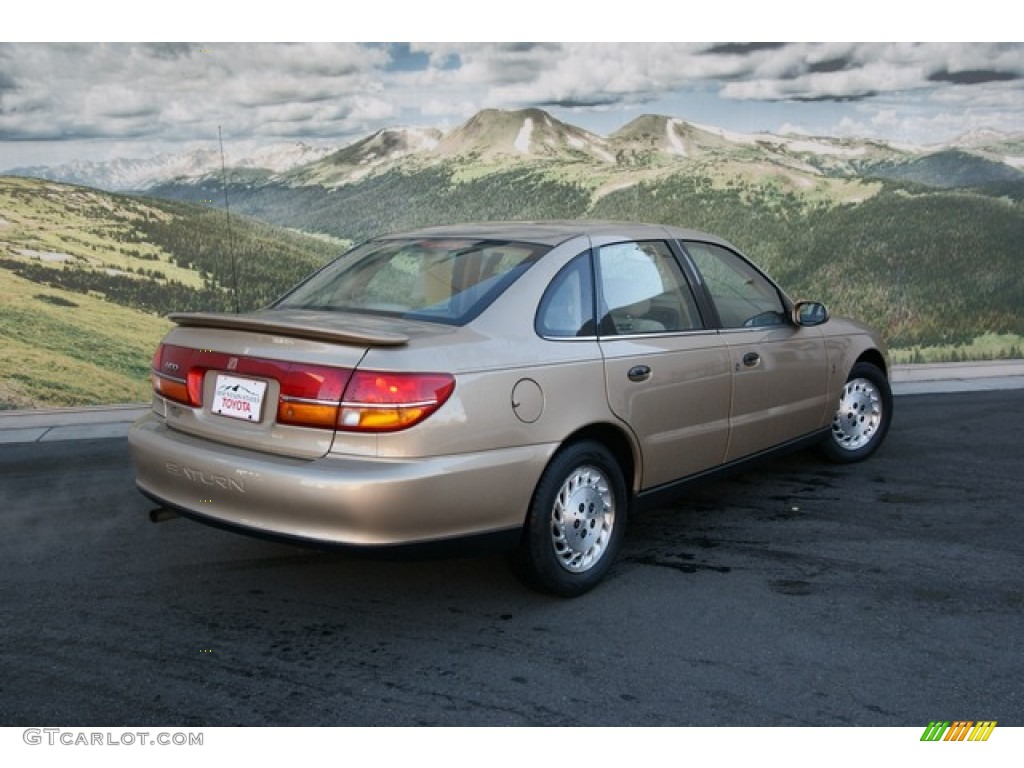 2002 L Series L100 Sedan - Medium Gold / Medium Tan photo #6