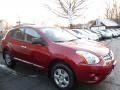 2011 Cayenne Red Nissan Rogue S AWD  photo #1