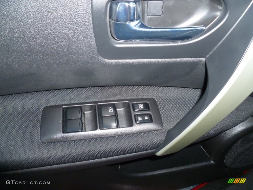 2011 Rogue S AWD - Cayenne Red / Black photo #22