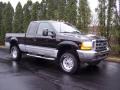 1999 Black Ford F250 Super Duty XLT Extended Cab 4x4  photo #1