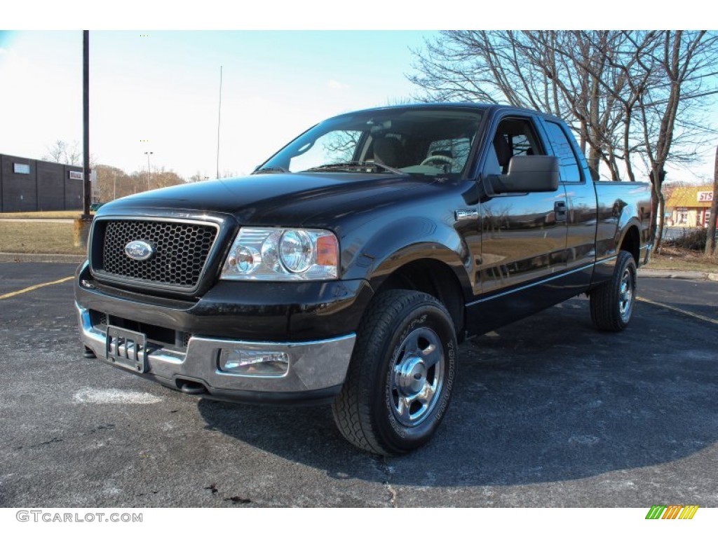 2004 F150 STX SuperCab 4x4 - Black / Medium/Dark Flint photo #1