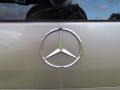 2004 Mercedes-Benz ML 350 4Matic Badge and Logo Photo