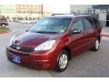 2004 Salsa Red Pearl Toyota Sienna LE  photo #1