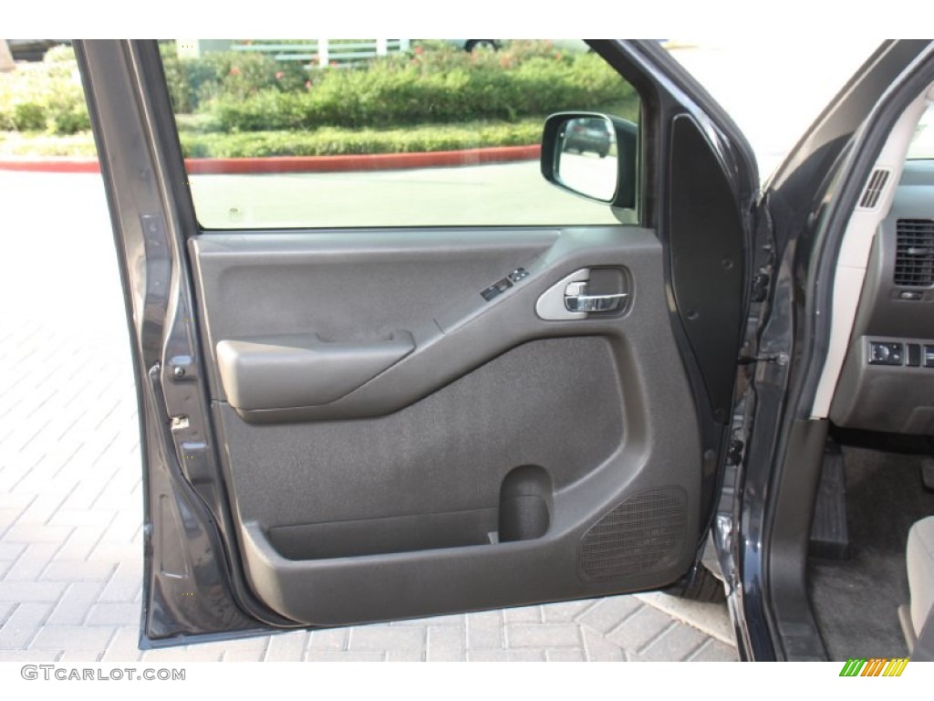 2010 Nissan Frontier SE V6 King Cab Graphite Door Panel Photo #76834705