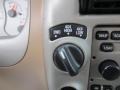 2002 Ford Explorer Sport Trac Medium Prairie Tan Interior Controls Photo