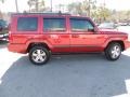 2009 Red Rock Crystal Pearl Jeep Commander Sport  photo #13