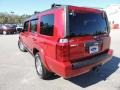 2009 Red Rock Crystal Pearl Jeep Commander Sport  photo #19
