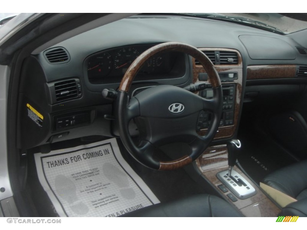 2004 XG350 L Sedan - Titanium / Black photo #19