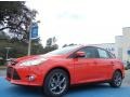 2013 Race Red Ford Focus SE Sedan  photo #1