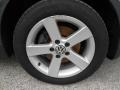 2004 Volkswagen Passat GLX 4Motion Wagon Wheel and Tire Photo