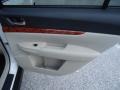 Warm Ivory 2010 Subaru Outback 3.6R Limited Wagon Door Panel