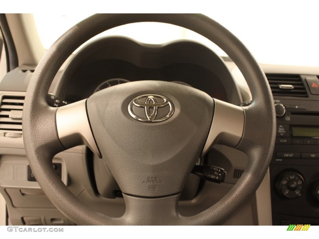 2010 Toyota Corolla LE Ash Steering Wheel Photo #76995173