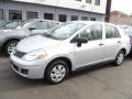 2011 Brilliant Silver Metallic Nissan Versa 1.6 Sedan  photo #2