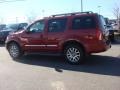 2010 Red Brick Nissan Pathfinder LE 4x4  photo #3