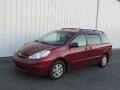 2010 Salsa Red Pearl Toyota Sienna LE  photo #1