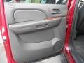 2010 Chevrolet Suburban Ebony Interior Door Panel Photo