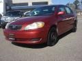 2006 Impulse Red Pearl Toyota Corolla LE  photo #1